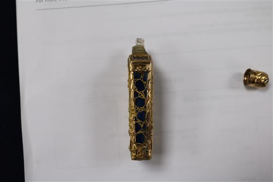An early 20th century continental gold overlaid enamelled glass scent bottle, 75mm.